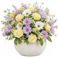 Arrangement floral artificiel avec fleurs pastel en pot beige